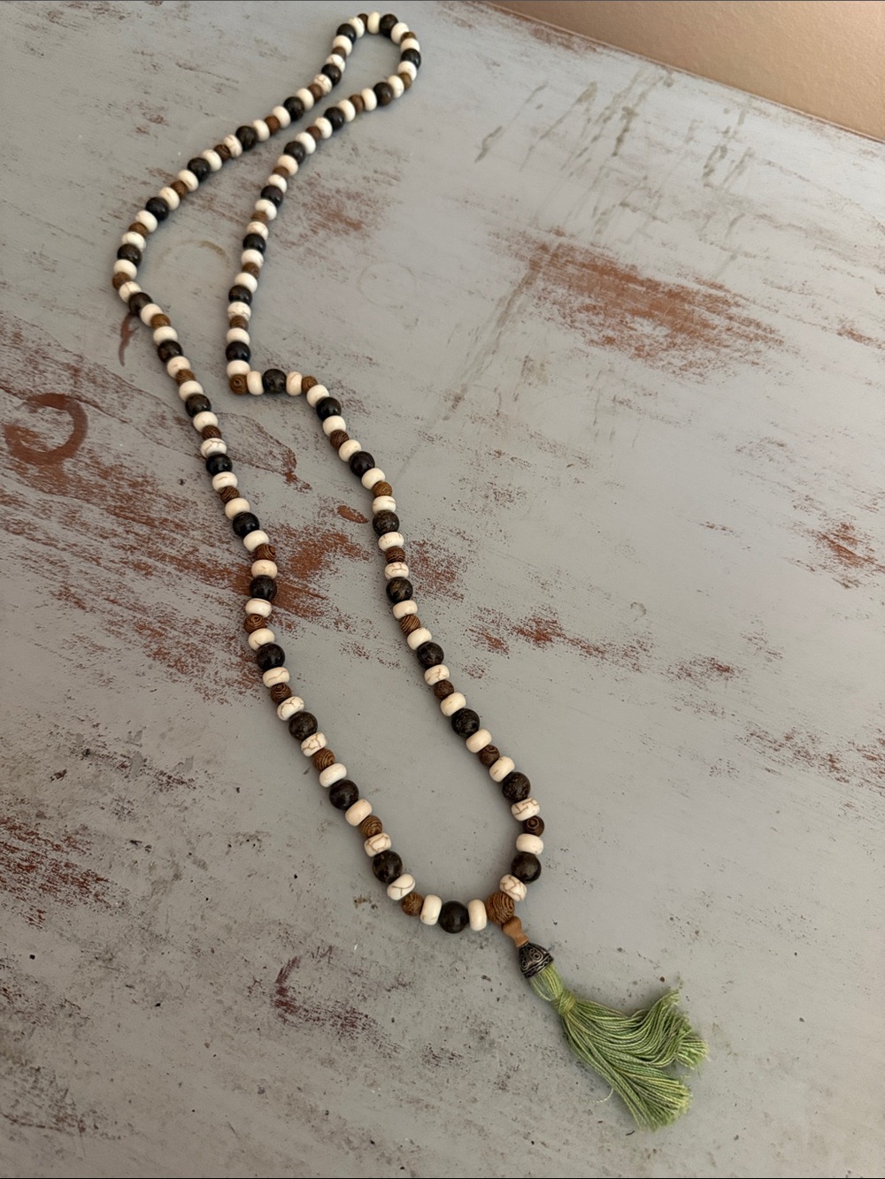 Handmade Neutral Bead Necklace with Green Tassel